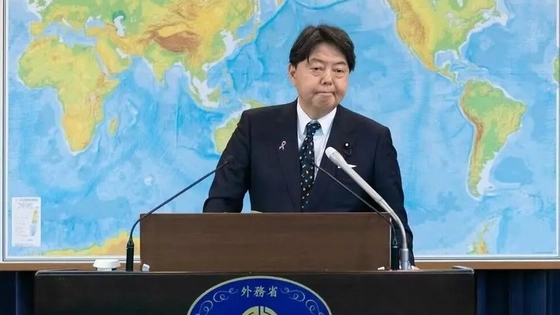 李强会见日本外相